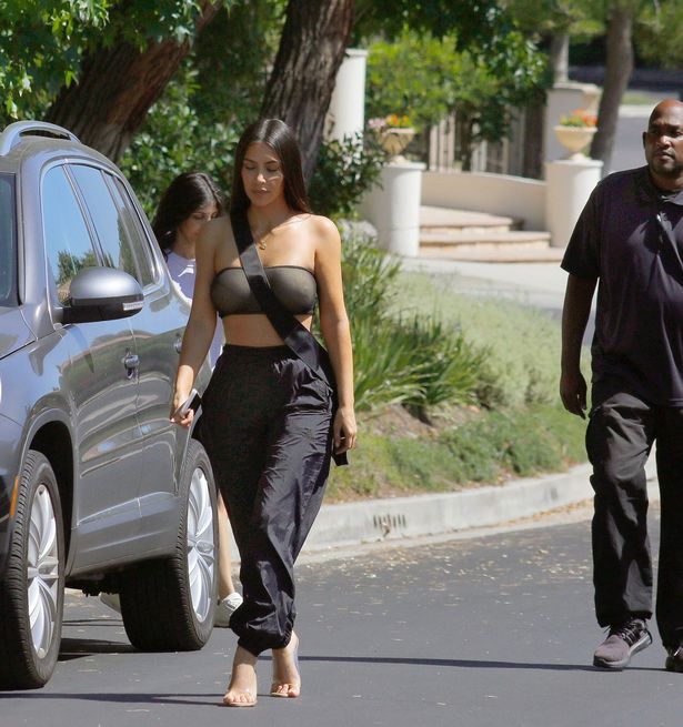 PAY-EXCLUSIVE-Kim-Kardashian-is-seen-out-in-Los-Angeles-with-her-bodyguard-after-attending-a-business-m (1)